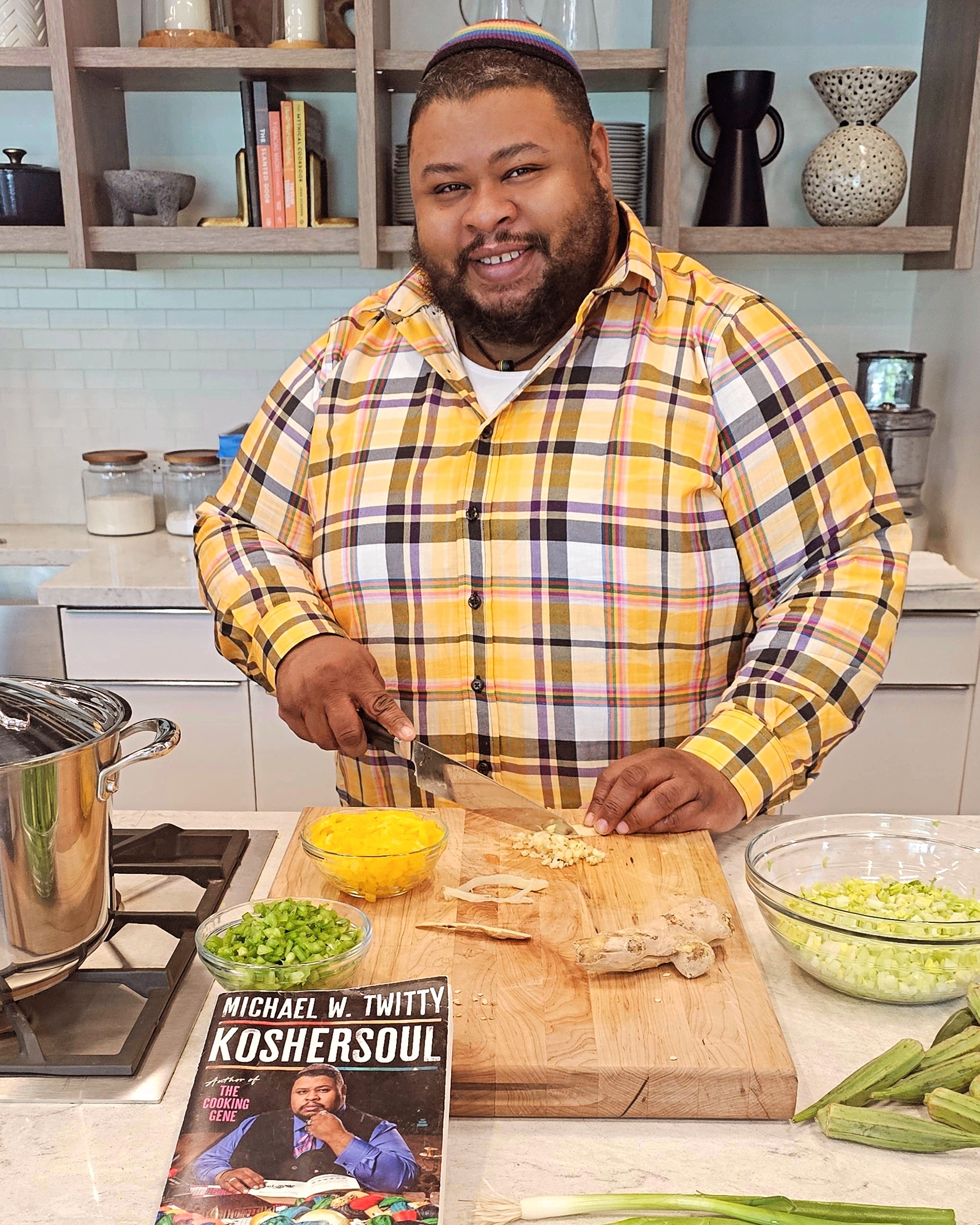 Michael W. Twitty preparing food in a kitchen